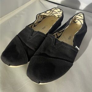 Toms Women’s Black Canvas Slip-Ons